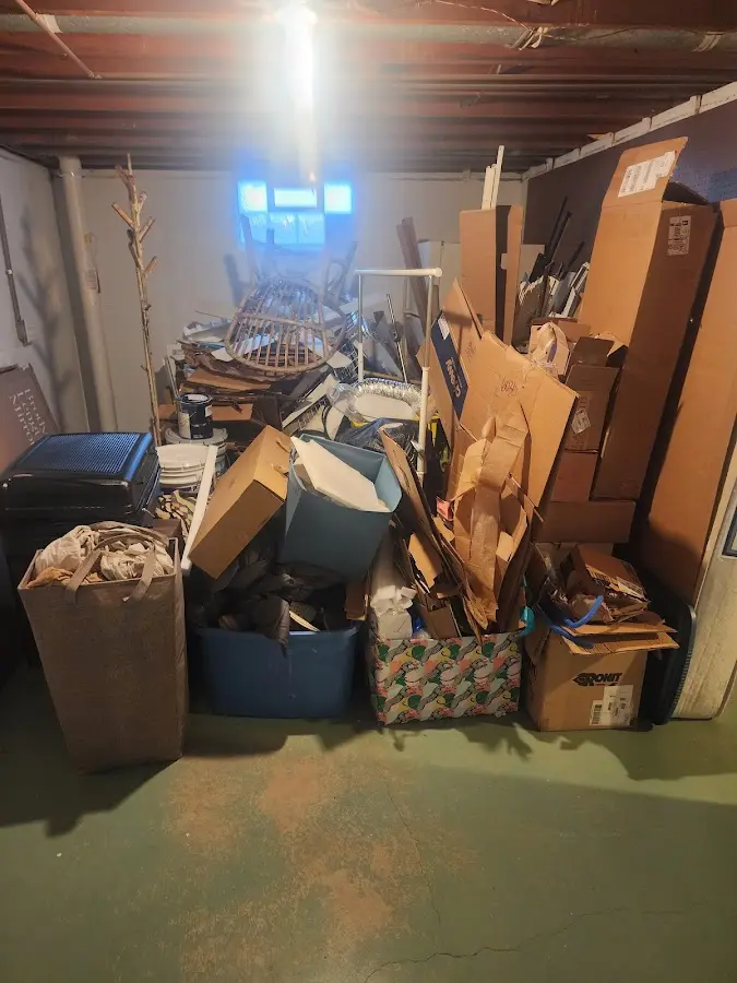 Roll-off dumpster container at job site for 6 Yard Dumpster Rental in Samoset